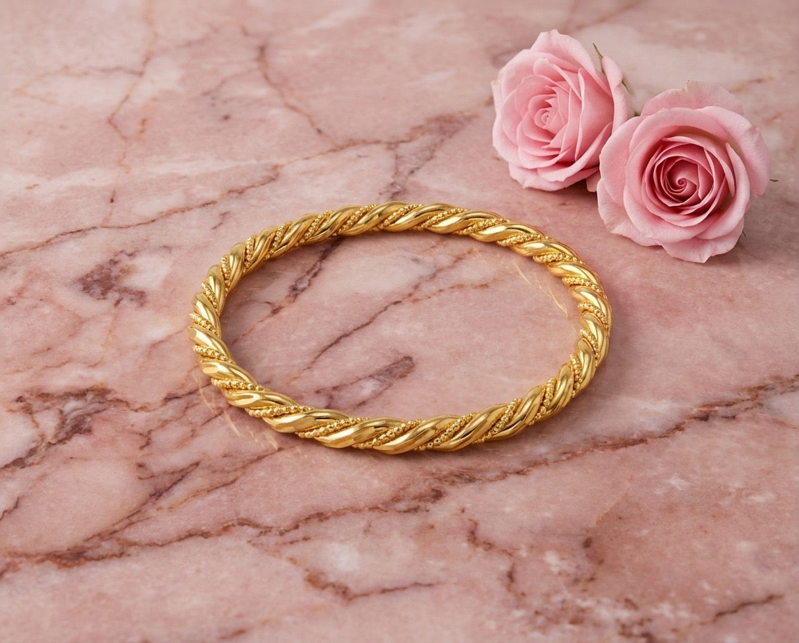 Aria Twist Gold Bangle