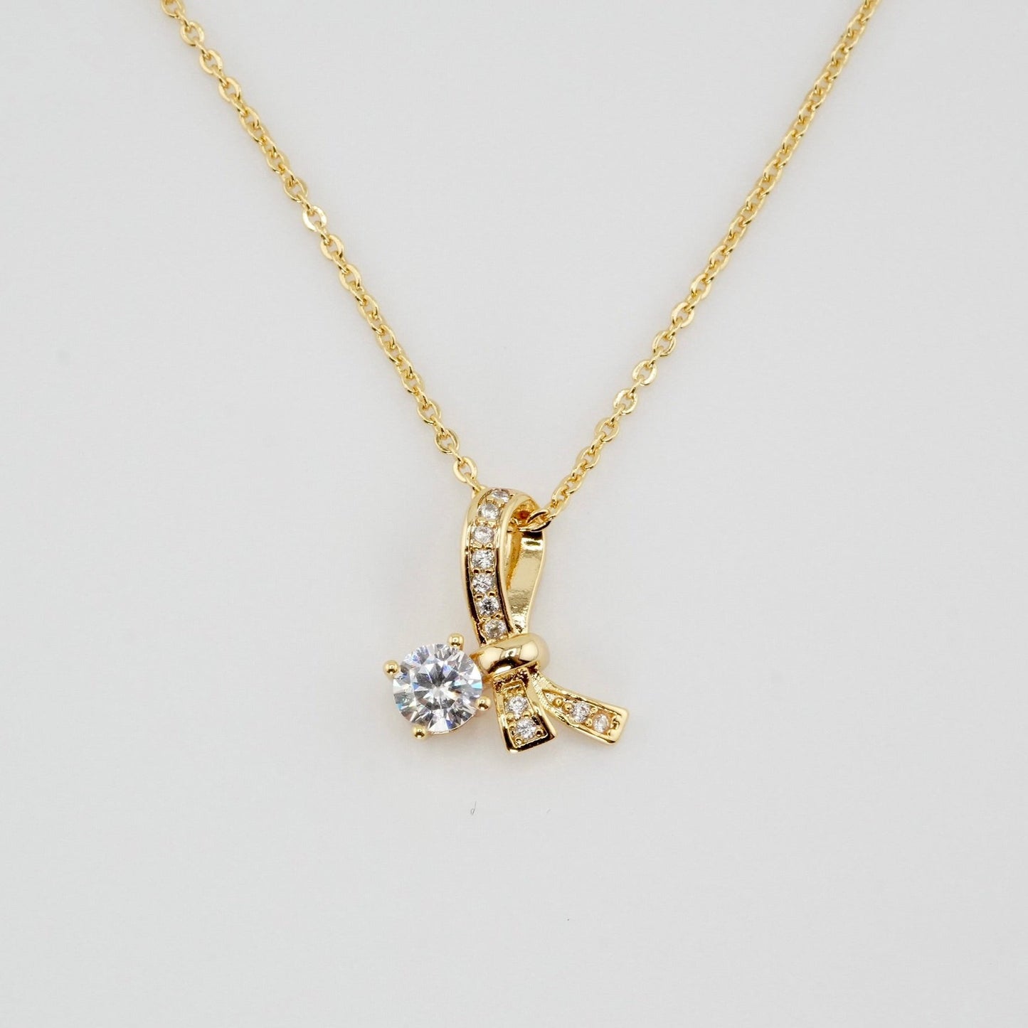Crystal Bow Charm Necklace